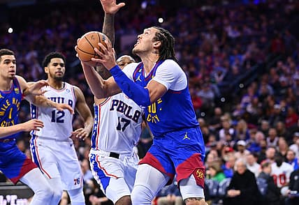 Jan 28, 2023; Philadelphia, Pennsylvania, USA; Denver Nuggets forward Aaron Gordon (50) drives against Philadelphia 76ers forward P.J. Tucker (17) in the first quarter at Wells Fargo Center. Mandatory Credit: Kyle Ross-USA TODAY Sports