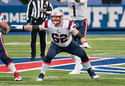 Nov 1, 2020; Orchard Park, New York, USA; New England Patriots offensive guard Joe Thuney (62) blocks on a play in the third quarter against the Buffalo Bills at Bills Stadium. Mandatory Credit: Mark Konezny-USA TODAY Sports