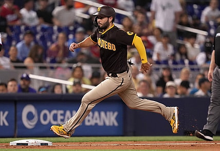 Jul 22, 2021; Miami, Florida, USA; San Diego Padres first baseman Eric Hosmer (30) advances to third base on a wild pitch by Miami Marlins relief pitcher Jordan Holloway (not pictured) in the 2nd inning at loanDepot park. Mandatory Credit: Jasen Vinlove-USA TODAY Sports