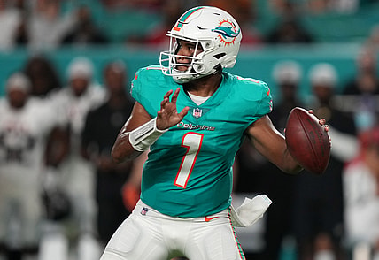 Aug 21, 2021; Miami Gardens, Florida, USA; Miami Dolphins quarterback Tua Tagovailoa (1) drops back to attempt a pass against the Atlanta Falcons during the first half at Hard Rock Stadium. Mandatory Credit: Jasen Vinlove-USA TODAY Sports