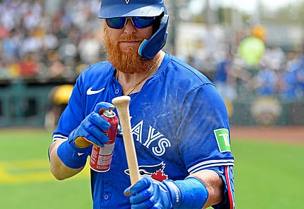 Blue Jays' Justin Turner (#2) uses some spray for a better grip. Pittsburgh Pirates with a dramatic 6-5 win over the Toronto Blue Jays on Tuesday March, 5, 2024, with an official attendance of 5,322 at LECOM Park formerly known as McKechnie Field located in Bradenton, Florida.