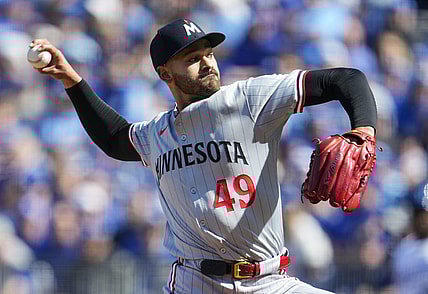 Mar 28, 2024; Kansas City, Missouri, USA; Minnesota Twins starting pitcher Pablo Lopez (49) pitches during the first inning against the Kansas City Royals at Kauffman Stadium. Mandatory Credit: Jay Biggerstaff-USA TODAY Sports