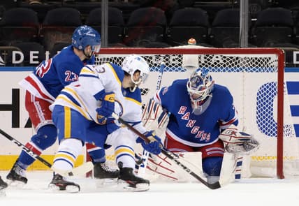 Mar 2, 2021; New York, New York, USA; New York Rangers goaltender Igor Shesterkin (31) blocks the net against Buffalo Sabres center Tobias Rieder (13) during the second period at Madison Square Garden. Mandatory Credit: Bruce Bennett-POOL PHOTOS-USA TODAY Sports