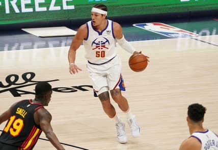 Mar 28, 2021; Denver, Colorado, USA; Denver Nuggets forward Aaron Gordon (50) controls the ball against the Atlanta Hawks in the first quarter at Ball Arena. Mandatory Credit: Ron Chenoy-USA TODAY Sports