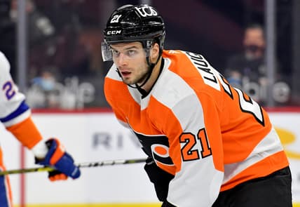 Mar 22, 2021; Philadelphia, Pennsylvania, USA; Philadelphia Flyers left wing Scott Laughton (21) against the New York Islanders at Wells Fargo Center. Mandatory Credit: Eric Hartline-USA TODAY Sports