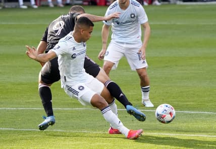 May 22, 2021; Chicago, Illinois, USA; Chicago Fire defender Miguel Angel Navarro (6) steals the ball from Inter Miami forward Gonzalo Higuain (9) during the first half at Soldier Field. Mandatory Credit: Mike Dinovo-USA TODAY Sports