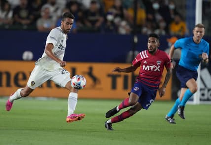 Jul 7, 2021; Carson, California, USA; LA Galaxy forward Ethan Zubak (29) moves the ball against FC Dallas forward Jesus Ferreira (9) during the first half at Dignity Health Park. Mandatory Credit: Kirby Lee-USA TODAY Sports