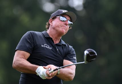 Aug 7, 2021; Memphis, Tennessee, USA; Phil Mickelson hits his tee shot on the second hole during the third round of the WGC FedEx St. Jude Invitational golf tournament at TPC Southwind. Mandatory Credit: Christopher Hanewinckel-USA TODAY Sports