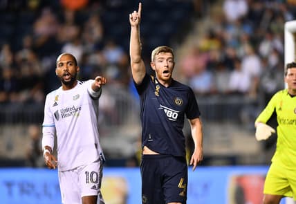 Sep 3, 2021; Philadelphia, Pennsylvania, USA; Philadelphia Union defender Stuart Findlay (4) and New England Revolution forward Teal Bunbury (10) call for a free kick in the first half at Subaru Park. Mandatory Credit: Kyle Ross-USA TODAY Sports