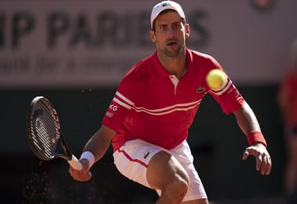Jun 13, 2021; Paris, France; Novak Djokovic (SRB) in action during the men's final against Stefanos Tsitsipas (GRE) on day 15 of the French Open at Stade Roland Garros. Mandatory Credit: Susan Mullane-USA TODAY Sports