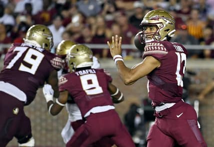 Sep 24, 2022; Tallahassee, Florida, USA; Florida State Seminoles quarterback Jordan Travis (13) drops back to throw the ball against the Boston College Eagles during the second half at Doak S. Campbell Stadium. Mandatory Credit: Melina Myers-USA TODAY Sports
