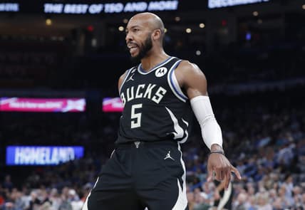 Nov 9, 2022; Oklahoma City, Oklahoma, USA; Milwaukee Bucks guard Jevon Carter (5) celebrates after scoring against the Oklahoma City Thunder during the second half at Paycom Center. Milwaukee won 136-132 in double overtime. Mandatory Credit: Alonzo Adams-USA TODAY Sports