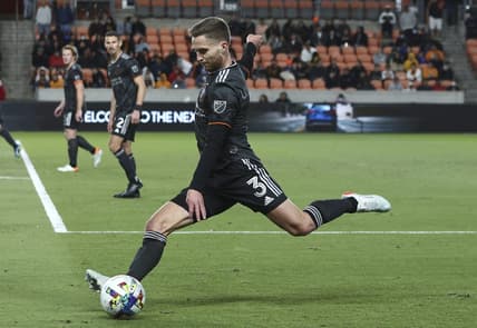 Feb 27, 2022; Houston, Texas, USA; Houston Dynamo FC defender Adam Lundkvist (3) kicks the ball during the second half against the Real Salt Lake at PNC Stadium. Mandatory Credit: Troy Taormina-USA TODAY Sports