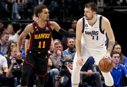 Jan 18, 2023; Dallas, Texas, USA;  Dallas Mavericks guard Luka Doncic (77) controls the ball as Atlanta Hawks guard Trae Young (11) defends during the second quarter at American Airlines Center. Mandatory Credit: Kevin Jairaj-USA TODAY Sports