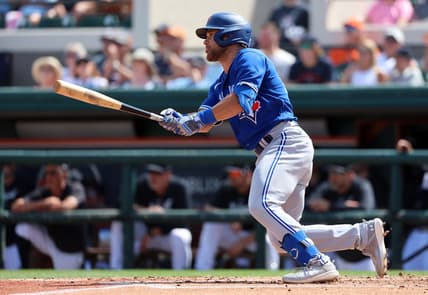 Mar 4, 2023; Lakeland, Florida, USA;  Toronto Blue Jays infielder Vinny Capra (47) hits a sacrifice RBI during the second inning against the Detroit Tigers at Publix Field at Joker Marchant Stadium. Mandatory Credit: Kim Klement-USA TODAY Sports