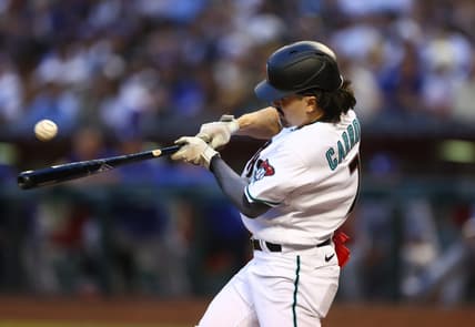 Apr 8, 2023; Phoenix, Arizona, USA; Arizona Diamondbacks outfielder Corbin Carroll hits a single in the fifth inning against the Los Angeles Dodgers at Chase Field. Mandatory Credit: Mark J. Rebilas-USA TODAY Sports