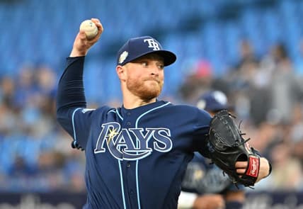 Apr 14, 2023; Toronto, Ontario, CAN;    Tampa Bay Rays starting pitcher Drew Rasmussen (57) delivers a pitch against the Toronto Blue Jays in the first inning at Rogers Centre. Mandatory Credit: Dan Hamilton-USA TODAY Sports
