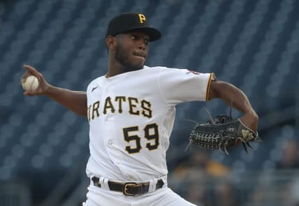 Apr 20, 2023; Pittsburgh, Pennsylvania, USA;  Pittsburgh Pirates starting pitcher Roansy Contreras (59) delivers a pitch against the Cincinnati Reds during the first inning at PNC Park. Mandatory Credit: Charles LeClaire-USA TODAY Sports