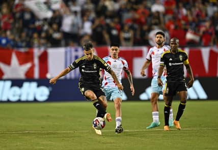 June 10, 2023; Chicago, Illinois, USA; Columbus Crew midfielder Lucas Zelarrayan (10) takes control of the ball in front of Chicago Fire midfielder Federico Navarro (31) in the second half at Soldier Field. Mandatory Credit: Jamie Sabau-USA TODAY Sports