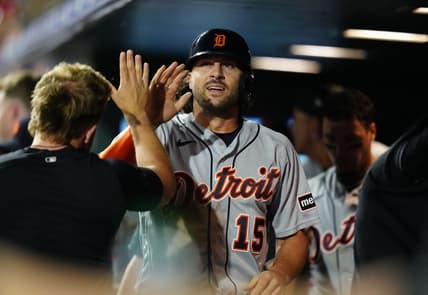 Jul 1, 2023; Denver, Colorado, USA; Detroit Tigers right fielder Jake Marisnick (15) celebrates scoring a run in the seventh inning against the Colorado Rockies at Coors Field. Mandatory Credit: Ron Chenoy-USA TODAY Sports