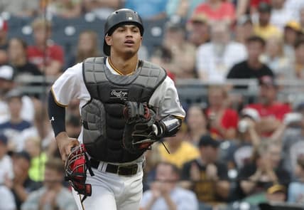 Jul 17, 2023; Pittsburgh, Pennsylvania, USA;  Pittsburgh Pirates catcher Endy Rodriguez (25) jogs off of the field in his major league debut against the Cleveland Guardians during the first inning at PNC Park. Mandatory Credit: Charles LeClaire-USA TODAY Sports
