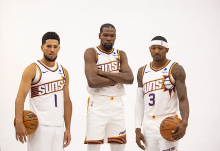 Oct 2, 2023; Phoenix, AZ, USA; Phoenix Suns guard Devin Booker (1), forward Kevin Durant (35) and guard Bradley Beal (3) pose for a portrait during media day at Footprint Center. Mandatory Credit: Mark J. Rebilas-USA TODAY Sports