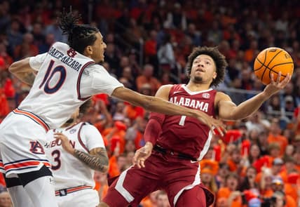 Alabama Crimson Tide guard Mark Sears (1) goes up for a layup as Auburn Tigers take on Alabama Crimson Tide at Neville Arena in Auburn, Ala., on Wednesday, Feb. 7, 2024.