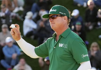 Feb 11, 2024; Scottsdale, AZ, USA; Charley Hoffman finishes with in the lead on the 18th hole during the final round of the WM Phoenix Open at TPC Scottsdale. Mandatory Credit: Rob Schumacher-Arizona Republic