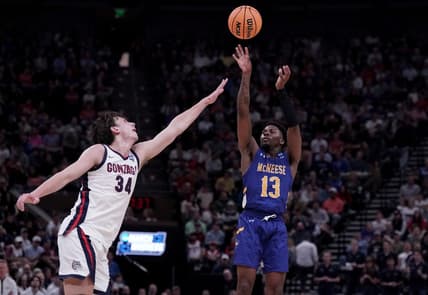 Mar 21, 2024; Salt Lake City, UT, USA; McNeese State Cowboys guard Shahada Wells (13) shoots against Gonzaga Bulldogs forward Braden Huff (34) during the second half in the first round of the 2024 NCAA Tournament at Vivint Smart Home Arena-Delta Center. Mandatory Credit: Gabriel Mayberry-USA TODAY Sports