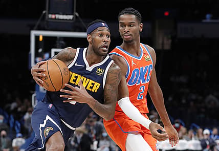 Jan 9, 2022; Oklahoma City, Oklahoma, USA; Denver Nuggets forward Will Barton (5) drives to the basket against Oklahoma City Thunder guard Shai Gilgeous-Alexander (2) during the second quarter at Paycom Center. Mandatory Credit: Alonzo Adams-USA TODAY Sports