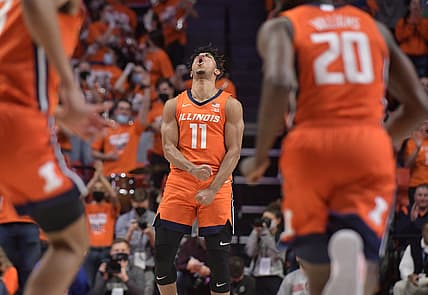 Feb 24, 2022; Champaign, Illinois, USA;  Illinois Fighting Illini guard Alfonso Plummer (11) reacts after hitting a three point shot during the first half against the Ohio State Buckeyes at State Farm Center. Mandatory Credit: Ron Johnson-USA TODAY Sports