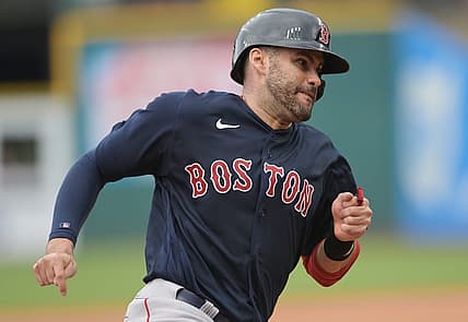Jun 26, 2022; Cleveland, Ohio, USA; Boston Red Sox designated hitter J.D. Martinez (28) advances to third on a single by left fielder Alex Verdugo (not pictured) during the sixth inning against the Cleveland Guardians at Progressive Field. Mandatory Credit: Ken Blaze-USA TODAY Sports