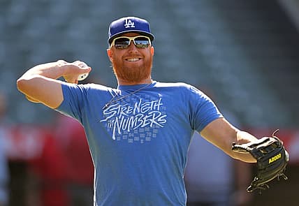Jul 15, 2022; Anaheim, California, USA; Los Angeles Dodgers third baseman Justin Turner (10) warms up before the game against the Los Angeles Angels at Angel Stadium. Mandatory Credit: Jayne Kamin-Oncea-USA TODAY Sports