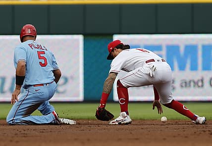 Jul 23, 2022; Cincinnati, Ohio, USA; St. Louis Cardinals designated hitter Albert Pujols (5) safely reaches second against Cincinnati Reds second baseman Jonathan India (6) during the second inning at Great American Ball Park. Mandatory Credit: David Kohl-USA TODAY Sports