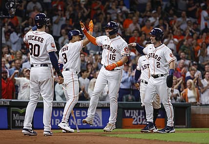 Aug 9, 2022; Houston, Texas, USA; Houston Astros left fielder Aledmys Diaz (16) celebrates with teammates after hitting a grad slam during the fourth inning against the Texas Rangers at Minute Maid Park. Mandatory Credit: Troy Taormina-USA TODAY Sports