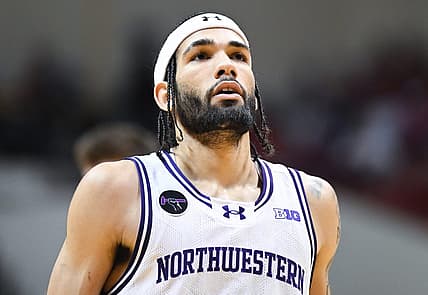 Feb 18, 2024; Bloomington, Indiana, USA;  Northwestern Wildcats guard Boo Buie (0) waits to attempt a free throw against the Indiana Hoosiers during the second half at Simon Skjodt Assembly Hall. Mandatory Credit: Robert Goddin-USA TODAY Sports