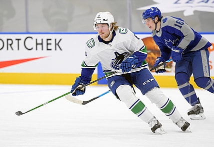 Feb 6, 2021; Toronto, Ontario, CAN;  Vancouver Canucks forward Brock Boeser (6) pursues the play ahead of Toronto Maple Leafs forward Mitchell Marner (16) in the first period at Scotiabank Arena. Mandatory Credit: Dan Hamilton-USA TODAY Sports