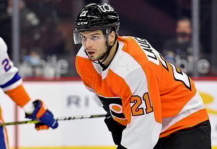 Mar 22, 2021; Philadelphia, Pennsylvania, USA; Philadelphia Flyers left wing Scott Laughton (21) against the New York Islanders at Wells Fargo Center. Mandatory Credit: Eric Hartline-USA TODAY Sports
