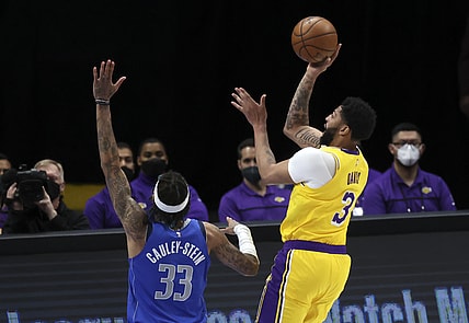 Apr 22, 2021; Dallas, Texas, USA;  Los Angeles Lakers forward Anthony Davis (3) shoots over Dallas Mavericks center Willie Cauley-Stein (33) during the first quarter at American Airlines Center. Mandatory Credit: Kevin Jairaj-USA TODAY Sports