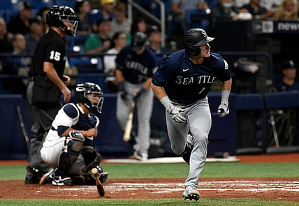 Aug 3, 2021; St. Petersburg, Florida, USA; Seattle Mariners center fielder Jarred Kelenic (10) hits a solo home run against the Tampa Bay Rays in the fourth inning at Tropicana Field. Mandatory Credit: Jonathan Dyer-USA TODAY Sports