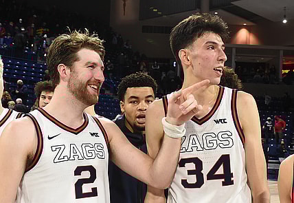 Dec 9, 2021; Spokane, Washington, USA; Gonzaga Bulldogs forward Drew Timme (2) and Gonzaga Bulldogs center Chet Holmgren (34) look at the Gonzaga student section after a game against the Merrimack Warriors in the second half at McCarthey Athletic Center. Gonzaga won 80-55. Mandatory Credit: James Snook-USA TODAY Sports