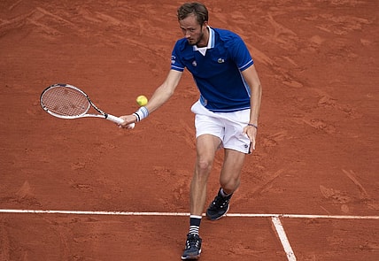 May 24, 2022; Paris, France; Daniil Medvedev returns a shot from Fecund Bagnis (ARG) during their match on day three of the French Open at Stade Roland-Garros.Mandatory Credit: Susan Mullane-USA TODAY Sports