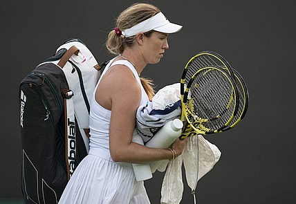 Jun 27, 2022; London, United Kingdom;  Danielle Collins (USA) leaves the court after her first round match against Marie Bouzkova (CZE) on day one at All England Lawn Tennis and Croquet Club. Mandatory Credit: Susan Mullane-USA TODAY Sports