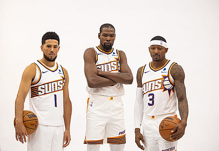 Oct 2, 2023; Phoenix, AZ, USA; Phoenix Suns guard Devin Booker (1), forward Kevin Durant (35) and guard Bradley Beal (3) pose for a portrait during media day at Footprint Center. Mandatory Credit: Mark J. Rebilas-USA TODAY Sports