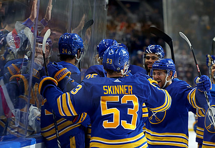 Oct 17, 2023; Buffalo, New York, USA;  Buffalo Sabres center Dylan Cozens (24) celebrates his overtime goal with teammates against the Tampa Bay Lightning at KeyBank Center. Mandatory Credit: Timothy T. Ludwig-USA TODAY Sports