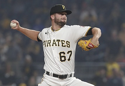 Jun 28, 2023; Pittsburgh, Pennsylvania, USA;  Pittsburgh Pirates relief pitcher Cody Bolton (67) pitches against the San Diego Padres during the ninth inning at PNC Park. Pittsburgh won 7-1. Mandatory Credit: Charles LeClaire-USA TODAY Sports