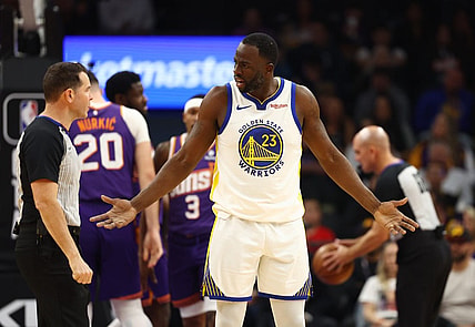 Dec 12, 2023; Phoenix, Arizona, USA; Golden State Warriors forward Draymond Green (23) reacts as he argues with an NBA referee against the Phoenix Suns at Footprint Center. Mandatory Credit: Mark J. Rebilas-USA TODAY Sports