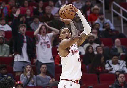 Jan 6, 2024; Houston, Texas, USA; Houston Rockets forward Jabari Smith Jr. (10) shoots the ball during the fourth quarter against the Milwaukee Bucks at Toyota Center. Mandatory Credit: Troy Taormina-USA TODAY Sports
