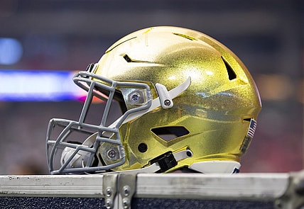 Jan 1, 2022; Glendale, Arizona, USA; Detailed view of a gold Notre Dame Fighting Irish helmet during the 2022 Fiesta Bowl at State Farm Stadium. Mandatory Credit: Mark J. Rebilas-USA TODAY Sports