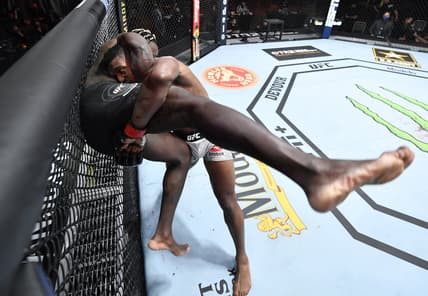 Mar 27, 2021; Las Vegas, NV, USA;   Alonzo Menifield takes down Fabio Cherant in their light heavyweight fight during the UFC 260 event at UFC APEX on March 27, 2021 in Las Vegas, Nevada.   Mandatory Credit: Jeff Bottari/Handout Photo via USA TODAY Sports